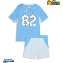 Manchester City Rico Lewis #82 Hjemmedraktsett Barn 2026-27 Kortermet (+ Korte bukser)